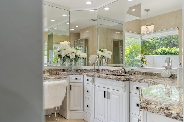 8076 Twin Lake Dr, Boca Raton, FL 33496 - bathroom featuring vanity, healthy amount of natural light, a chandelier, and recessed lighting