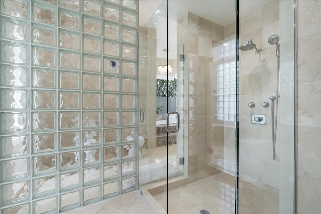 8076 Twin Lake Dr, Boca Raton, FL 33496 - bathroom featuring a stall shower and tile patterned flooring