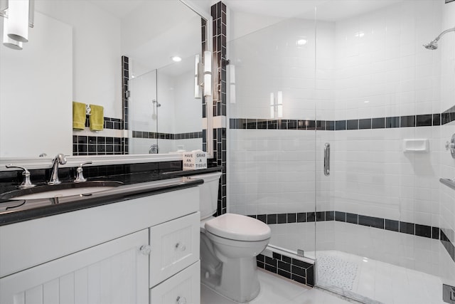 8076 Twin Lake Dr, Boca Raton, FL 33496 - bathroom featuring a shower stall, vanity, and toilet