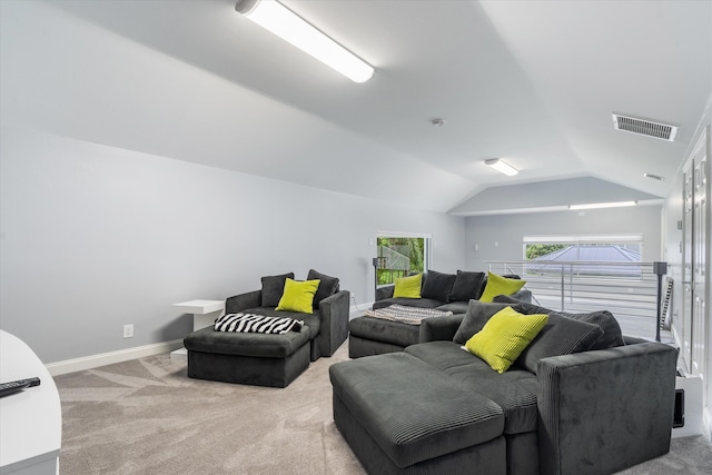 8076 Twin Lake Dr, Boca Raton, FL 33496 - living area featuring vaulted ceiling, carpet floors, and baseboards