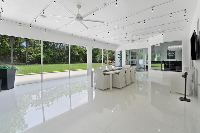 8076 Twin Lake Dr, Boca Raton, FL 33496 - sunroom / solarium featuring view of scattered trees