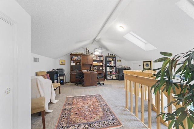 1920 Westminster Cir Unit 6, Vero Beach, FL 32966 - home office featuring a skylight, light carpet, a ceiling fan, and a textured ceiling