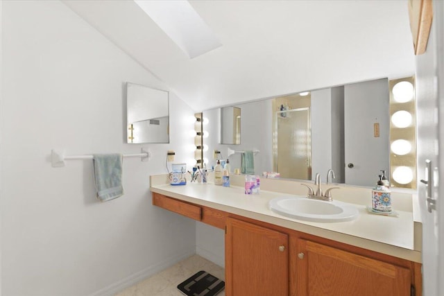 1920 Westminster Cir Unit 6, Vero Beach, FL 32966 - full bathroom featuring a shower stall, vanity, vaulted ceiling, and baseboards
