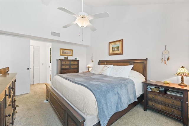 1920 Westminster Cir Unit 6, Vero Beach, FL 32966 - carpeted bedroom featuring a high ceiling and a ceiling fan
