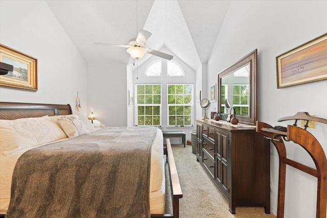 1920 Westminster Cir Unit 6, Vero Beach, FL 32966 - bedroom with lofted ceiling, light carpet, and a ceiling fan