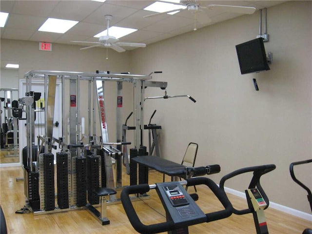 1920 Westminster Cir Unit 6, Vero Beach, FL 32966 - gym with ceiling fan, wood finished floors, baseboards, and a paneled ceiling