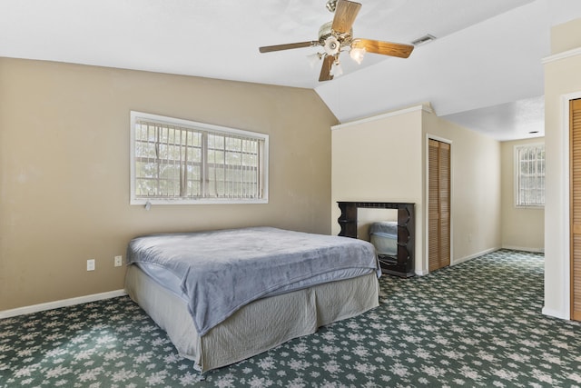 14685 40th St N, Loxahatchee Groves, FL 33470 - carpeted bedroom featuring baseboards, lofted ceiling, and a ceiling fan