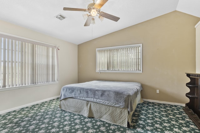 14685 40th St N, Loxahatchee Groves, FL 33470 - bedroom with vaulted ceiling, multiple windows, carpet, and baseboards