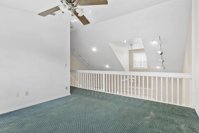 14685 40th St N, Loxahatchee Groves, FL 33470 - carpeted empty room featuring ceiling fan, lofted ceiling, and baseboards