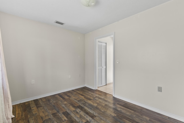 14685 40th St N, Loxahatchee Groves, FL 33470 - spare room featuring wood finished floors and baseboards