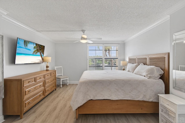 22 Royal Palm Way Unit 205, Boca Raton, FL 33432 - bedroom featuring a textured ceiling, crown molding, light wood-style floors, and a ceiling fan