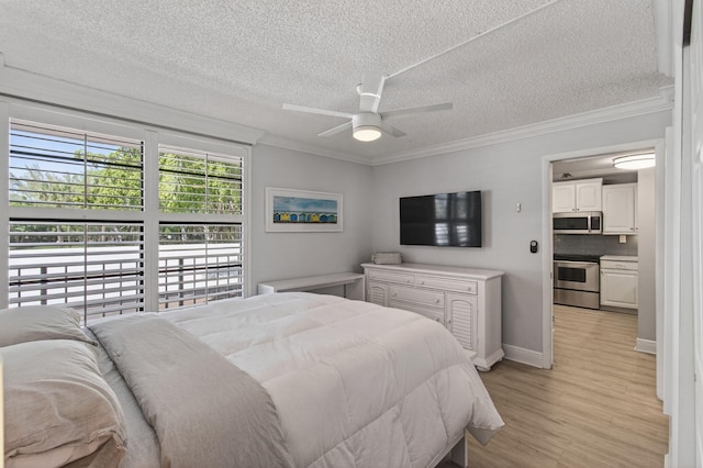 22 Royal Palm Way Unit 205, Boca Raton, FL 33432 - bedroom featuring crown molding, a textured ceiling, light wood-style floors, and ceiling fan