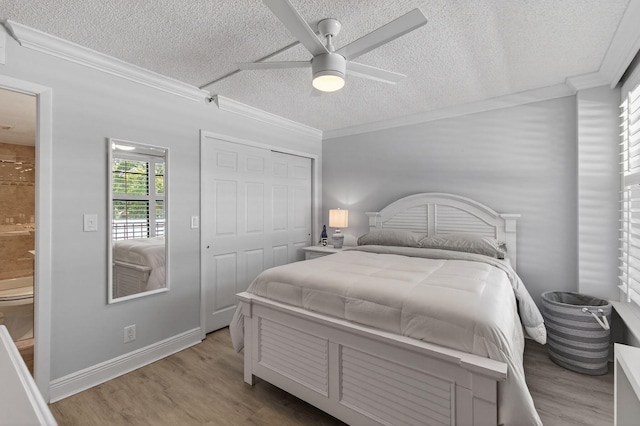 22 Royal Palm Way Unit 205, Boca Raton, FL 33432 - bedroom with a textured ceiling, wood finished floors, crown molding, a closet, and ceiling fan
