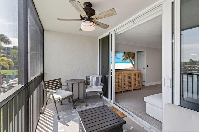 22 Royal Palm Way Unit 205, Boca Raton, FL 33432 - sunroom featuring ceiling fan