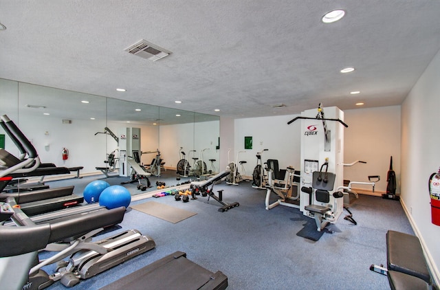 22 Royal Palm Way Unit 205, Boca Raton, FL 33432 - workout area with recessed lighting and a textured ceiling
