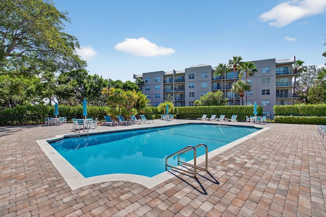 22 Royal Palm Way Unit 205, Boca Raton, FL 33432 - community pool featuring a patio area