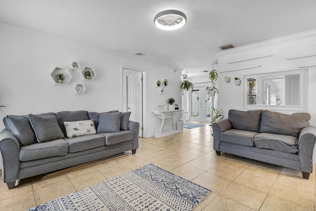 9277 Bloomfield Dr, Palm Beach Gardens, FL 33410 - living area featuring light tile patterned floors and crown molding