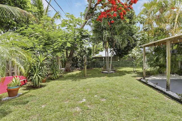 9277 Bloomfield Dr, Palm Beach Gardens, FL 33410 - fenced backyard with a patio