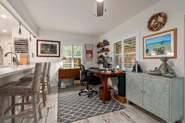 5551 SE Nassau Ter, Stuart, FL 34997 - office with a sink, light wood finished floors, a ceiling fan, and recessed lighting