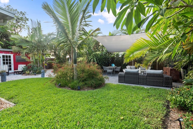 5551 SE Nassau Ter, Stuart, FL 34997 - view of yard with a patio and an outdoor living space
