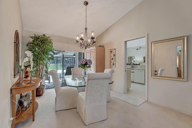 1500 Chapparel Way, Wellington, FL 33414 - dining area with vaulted ceiling, a chandelier, and light carpet