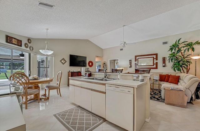 1500 Chapparel Way, Wellington, FL 33414 - kitchen with white dishwasher, open floor plan, ceiling fan, light countertops, and pendant lighting
