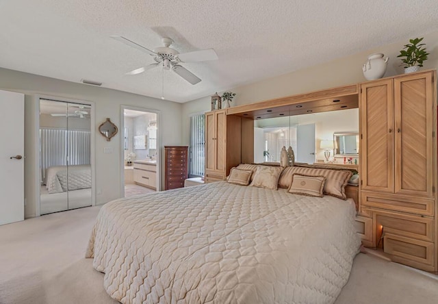 1500 Chapparel Way, Wellington, FL 33414 - bedroom featuring light colored carpet, a textured ceiling, and a ceiling fan