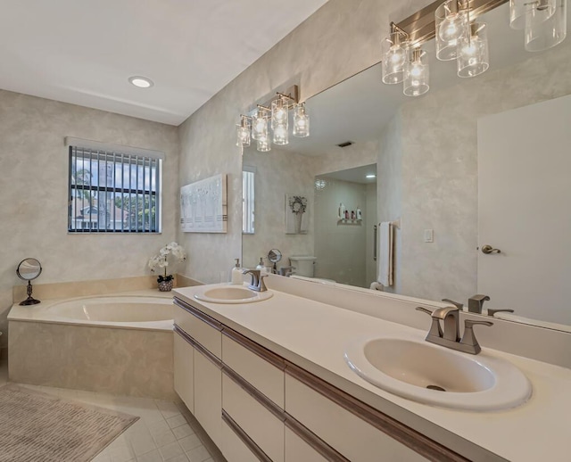 1500 Chapparel Way, Wellington, FL 33414 - bathroom featuring a garden tub, tile patterned floors, and double vanity