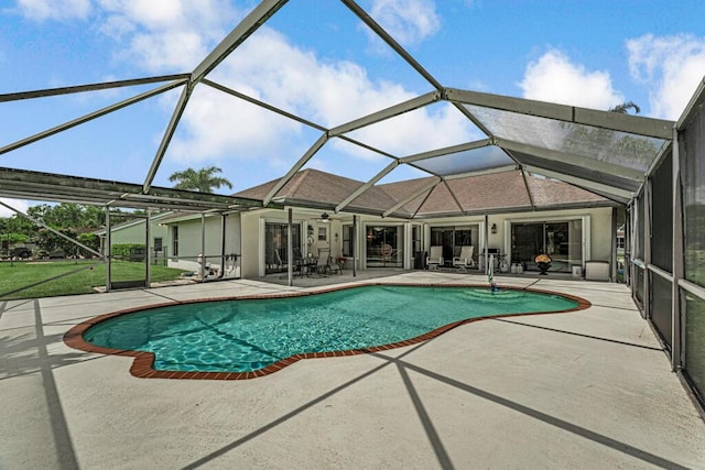1500 Chapparel Way, Wellington, FL 33414 - swimming pool with a patio, a ceiling fan, and a lanai