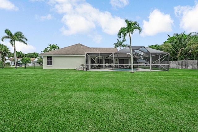 1500 Chapparel Way, Wellington, FL 33414 - back of house featuring a patio area, glass enclosure, stucco siding, and a shingled roof