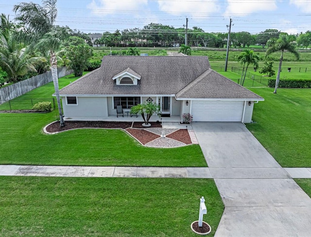 1500 Chapparel Way, Wellington, FL 33414 - view of front of home with a garage, concrete driveway, covered porch, and roof with shingles
