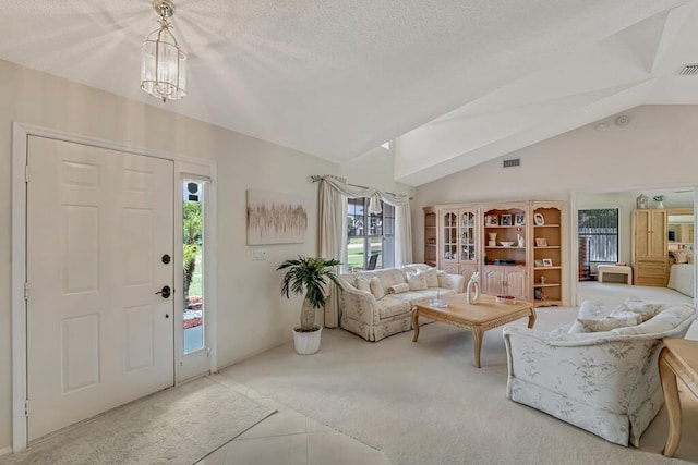 1500 Chapparel Way, Wellington, FL 33414 - carpeted entrance foyer with vaulted ceiling and a chandelier