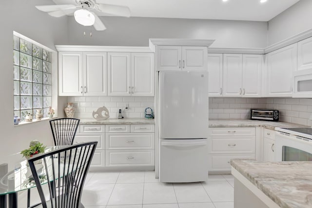5414 Venetia Ct Unit G, Boynton Beach, FL 33437 - kitchen featuring white appliances, decorative backsplash, ceiling fan, white cabinets, and recessed lighting