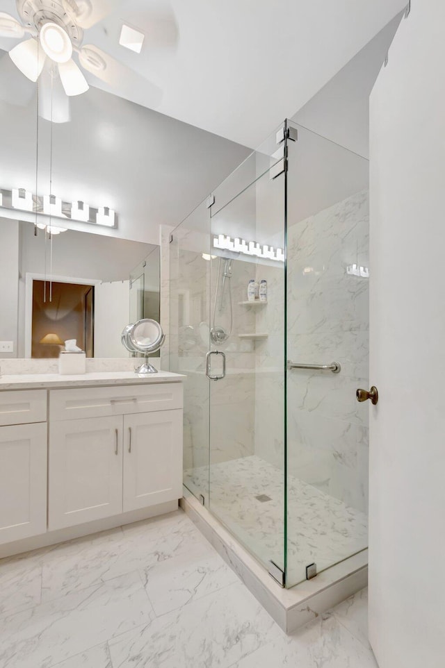5414 Venetia Ct Unit G, Boynton Beach, FL 33437 - full bathroom with ceiling fan, marble look tiles, a marble finish shower, and vanity
