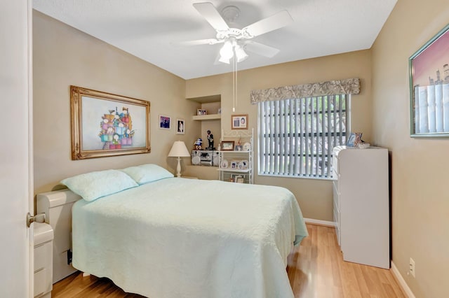 5414 Venetia Ct Unit G, Boynton Beach, FL 33437 - bedroom featuring light wood finished floors, ceiling fan, and baseboards