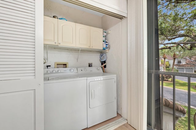 5414 Venetia Ct Unit G, Boynton Beach, FL 33437 - laundry area with cabinet space and washing machine and dryer