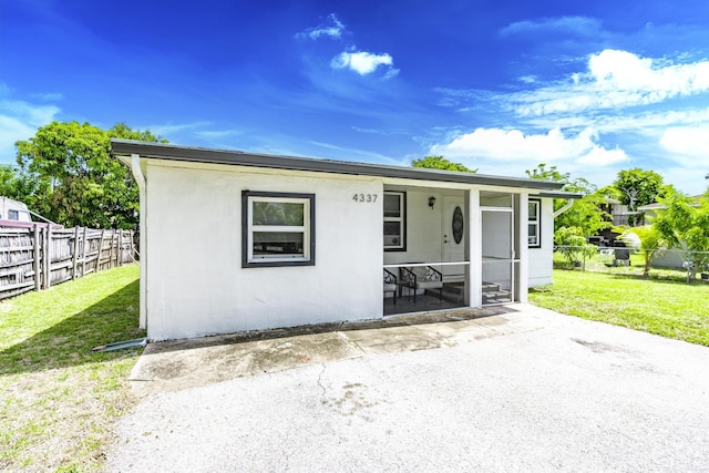 4337 Clinton Blvd, Lake Worth, FL 33461 - view of front of house featuring a patio area