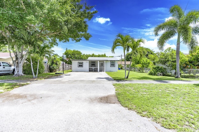 4337 Clinton Blvd, Lake Worth, FL 33461 - ranch-style home with driveway