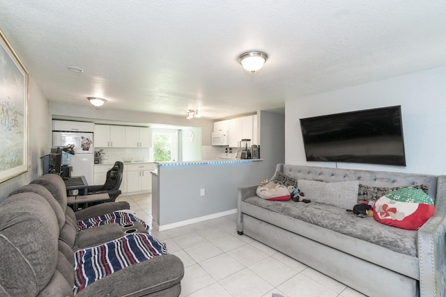 4337 Clinton Blvd, Lake Worth, FL 33461 - living room featuring light tile patterned floors