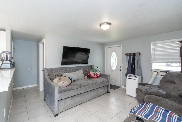 4337 Clinton Blvd, Lake Worth, FL 33461 - living room featuring light tile patterned floors and a textured ceiling