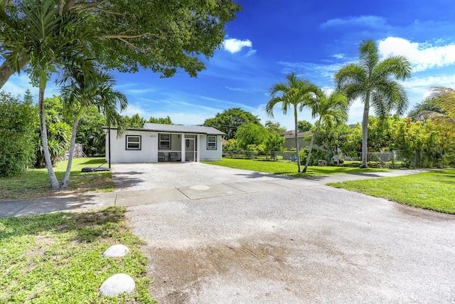 4337 Clinton Blvd, Lake Worth, FL 33461 - view of front of home featuring driveway