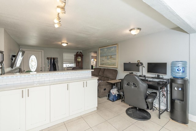 4337 Clinton Blvd, Lake Worth, FL 33461 - home office featuring light tile patterned floors and track lighting