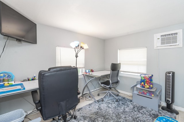 4337 Clinton Blvd, Lake Worth, FL 33461 - home office featuring a wall unit AC and baseboards