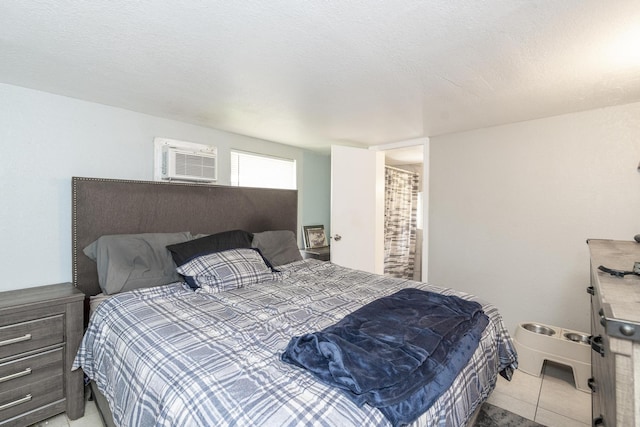 4337 Clinton Blvd, Lake Worth, FL 33461 - bedroom featuring a wall mounted air conditioner and light tile patterned flooring