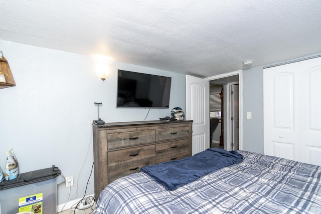 4337 Clinton Blvd, Lake Worth, FL 33461 - bedroom with a textured ceiling and a closet