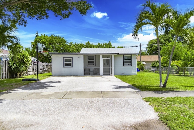 4337 Clinton Blvd, Lake Worth, FL 33461 - view of front of home with driveway and a porch