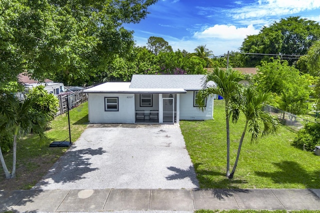 4337 Clinton Blvd, Lake Worth, FL 33461 - view of front of property featuring driveway