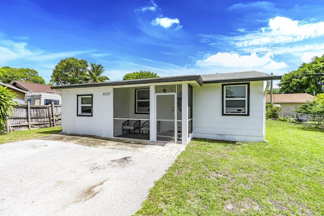 4337 Clinton Blvd, Lake Worth, FL 33461 - bungalow featuring a sunroom and a patio