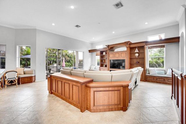 4450 SW Long Bay Dr, Palm City, FL 34990 - living room with recessed lighting, healthy amount of natural light, and crown molding