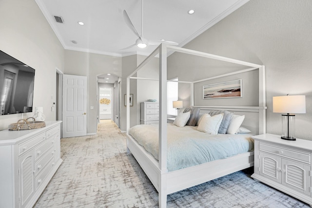 4450 SW Long Bay Dr, Palm City, FL 34990 - bedroom featuring arched walkways, crown molding, recessed lighting, light carpet, and baseboards